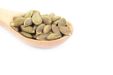Pumpkin seeds on a white background
