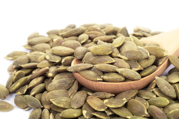 Pumpkin seeds on a white background
