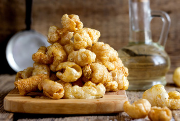Chicharron - deep fried pork rinds, crispy pork skin pieces, traditional mexican snack