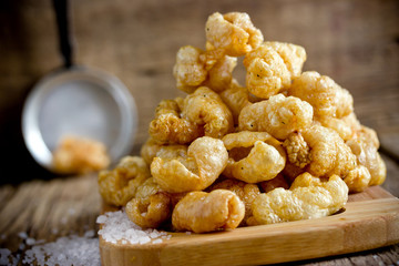 Chicharron - deep fried pork rinds, crispy pork skin pieces, traditional mexican snack