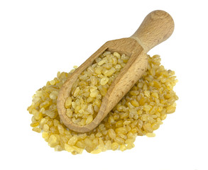 Bulgur or couscous on wooden scoop isolated on white background
