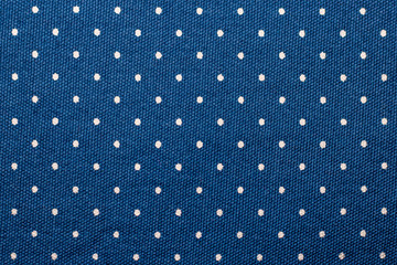 Abstract seamless background with blue fabric with white dots