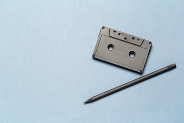 Pencil tool to rewind the tape cassettes on light gray background
