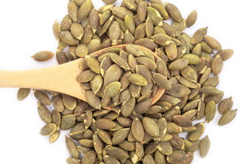 Pumpkin seeds on a white background