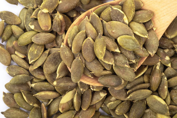 Pumpkin seeds on a white background