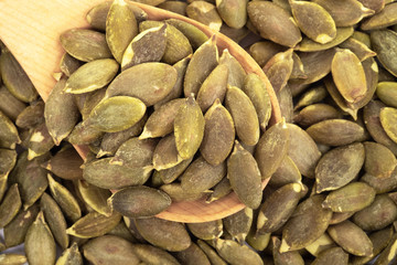 Pumpkin seeds on a white background