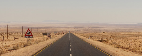 Driving through the Namid Desert near Lüderitz, Namibia. © Christopher