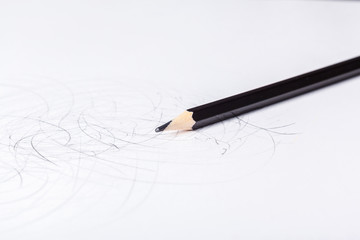 Pencil isolated close up on white background top view