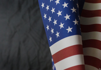 Obraz premium The Veterans Day concept united states of America flag on black background..