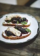 Blackberry jam with vegan cream cheese on toast