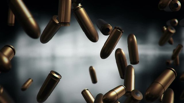 Animation falling of bullets different calibers on dark and blurred background. Animation of seamless loop.