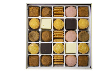 Isolated white background of many cookies in the box with clipping path.