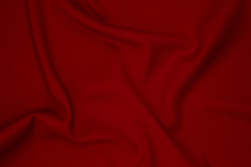 Wrinkled red fabric texture background.