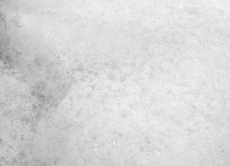Soap foam or white bubbles background. Abstract froth texture.