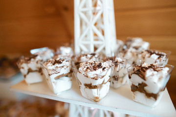 Small cups of tiramisu dessert. Catering concept