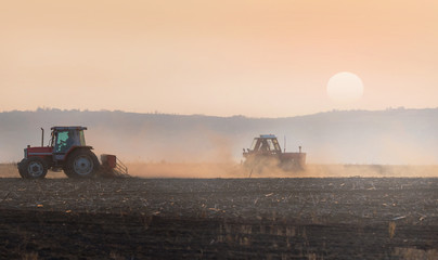 Naklejka premium Plowing of stubble field