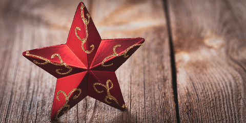 red star on weathered wooden board
