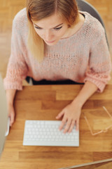 Young woman working at a computer