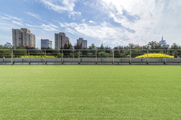 Obraz premium Panoramic skyline and modern business office buildings with empty road,empty concrete square floor