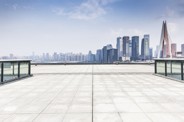 Panoramic skyline and modern business office buildings with empty road,empty concrete square floor