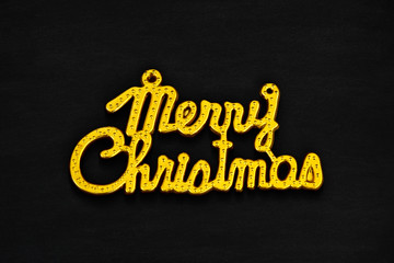 Gold Merry Christmas Text on Black Background