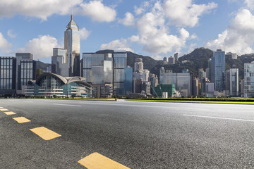 Panoramic skyline and modern business office buildings with empty road,empty concrete square floor