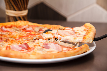 A slice of Hot Pizza