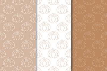 Halloween pumpkin patterns. Brown and white seamless backgrounds