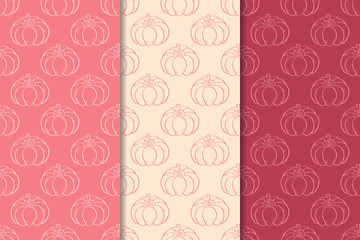 Halloween pumpkin patterns. Cherry red and beige seamless backgrounds