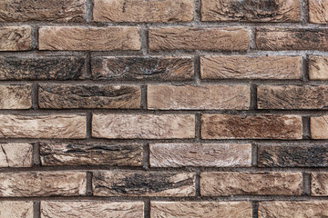 Brown brick wall on street texture