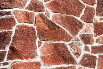 Red encaustic sandstone wall texture