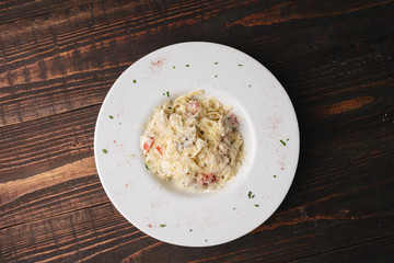 Ham and parmesan salad with tomatoes and сroutons