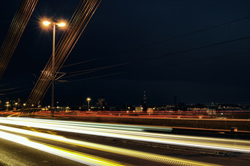 Fototapeta na wymiar City Sign Ludwigshafen Bridge Mannheim Rhine Transport logistic night time exposure driving europe skyline
