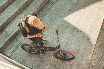 Guy on the street with his bmx bike