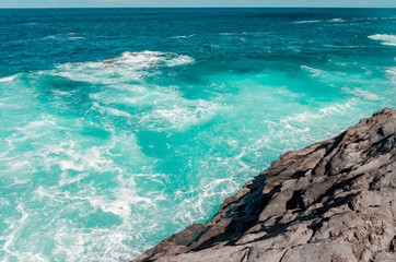 ocean landscape. blue water and rock coasline