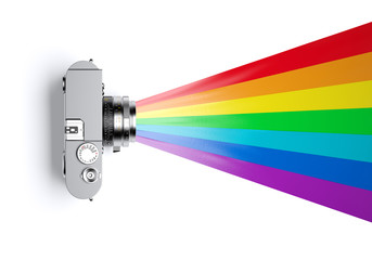 Rainbow colors coming out of the lens of a vintage viewfinder camera. 3d illustration.