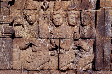 Fototapeta na wymiar Reliefs im Borobodur (Java) - Darstellungen aus dem Leben von Buddha