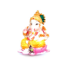 Decorative Ganesha statuette isolated on white background. 