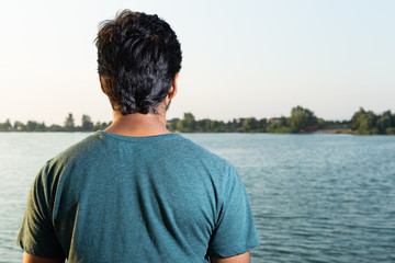 Man artistic picture with back to camera.