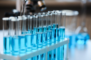 Test tube of glass overflows liquid solution potassium