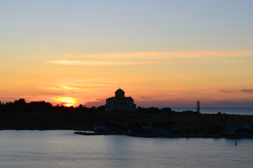 Fototapeta premium Chersonese. View of St. Vladimir's Cathedral across the Bay at sunset