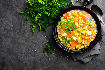 Healthy vegetarian vegetable soup with lentil and vegetables. Lentil soup with vegetables