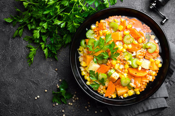 Healthy vegetarian vegetable soup with lentil and vegetables. Lentil soup with vegetables