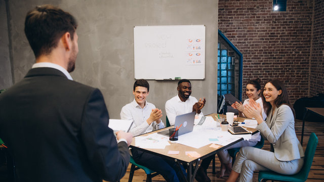 Business conference. Business meeting. Business people in formalwear discussing something while sitting together at the table. startup