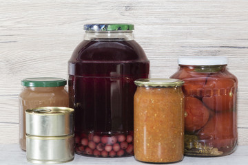 Storage shelves in pantry with homemade canned preserved fruits and vegetables