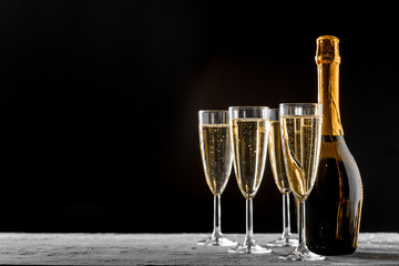 glasses of champagne with the bottle