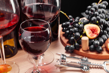 wine and grapes on the table