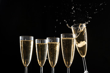 Glasses of champagne with splash