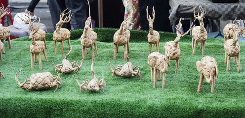Small wicker made from straw toys