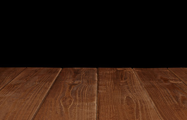 Empty wooden table perspective view on black background with clipping path